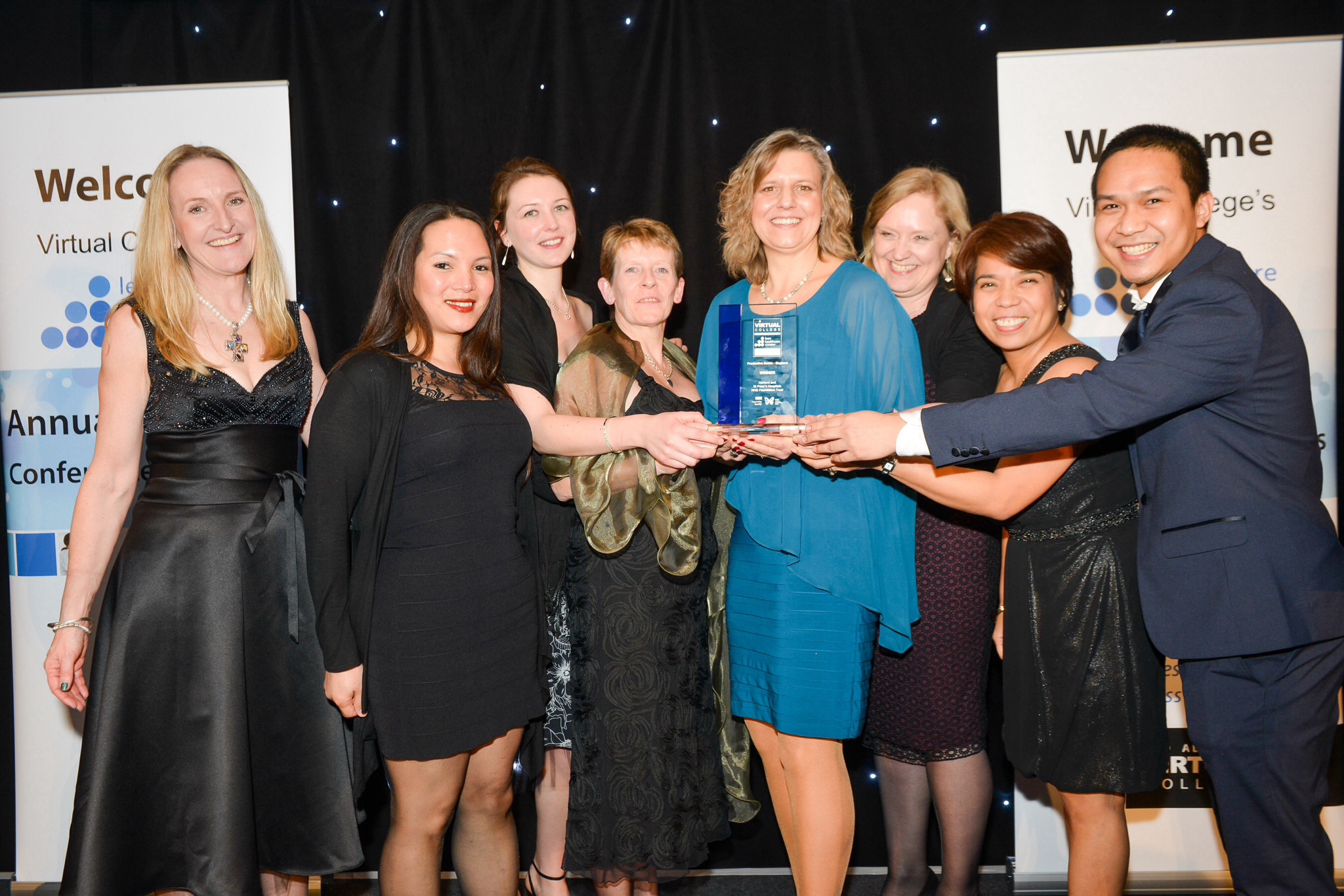 Sally and the team receiving their award