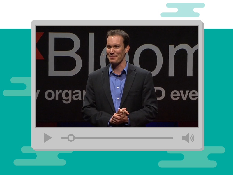 Still image of video player showing Shawn Achor speaking on stage.